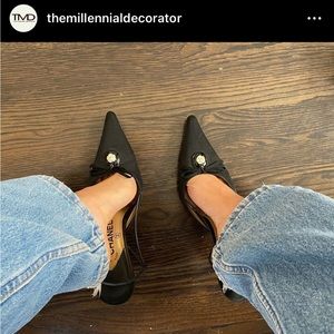 Vintage Chanel slingbacks with camellia